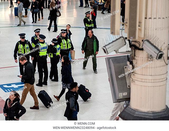 CCTV cameras in Victoria Station look on from above as the Metropolitan Police post more officers in Underground Stations following the suspected terrorist...