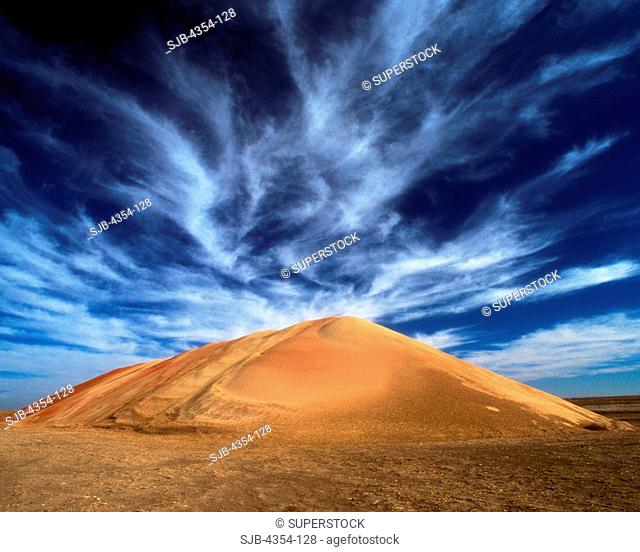 Cirrus Clouds Over a Man-Made Sand Dune