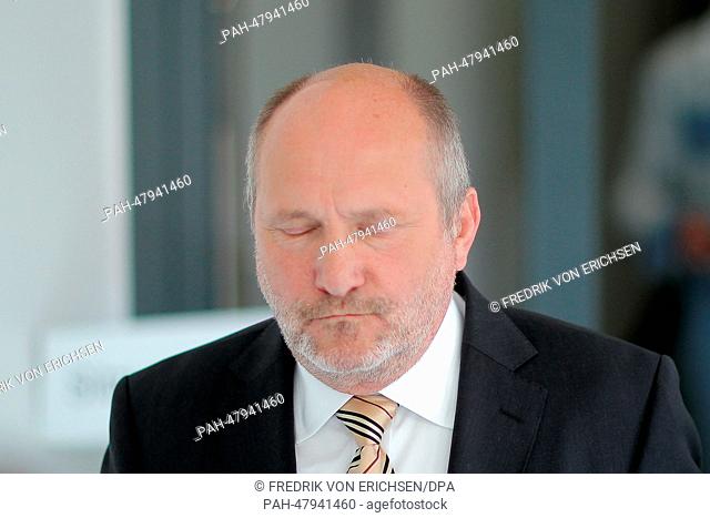 Former finance minister of Rhineland-Palatinate Ingolf Deubel leaves the regional court in Koblenz, Germany, 16 April 2014