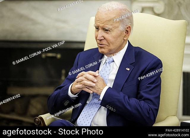 United States President Joe Biden meets with US Air Force General Charles Q. Brown, Jr, Chair, Joint Chiefs of Staff, in the Oval Office of the White House in...