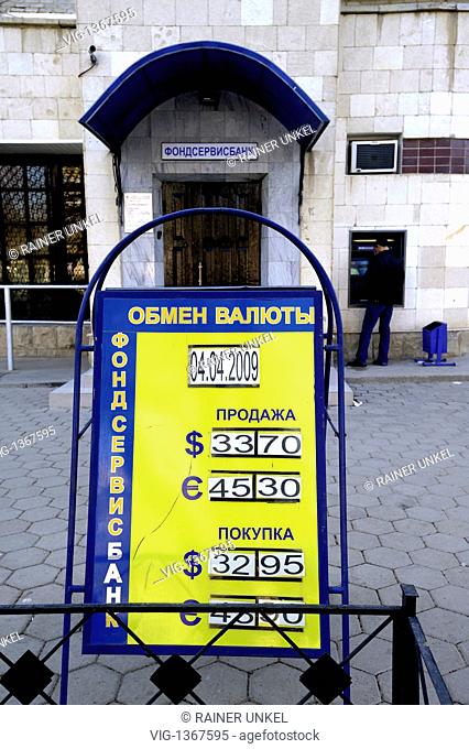 KAZ, KAZAKHSTAN : An information for currency exchange in front of a bank in Baikonur - Baikonur, Kazakhstan, Kazakhstan, 04/04/2009