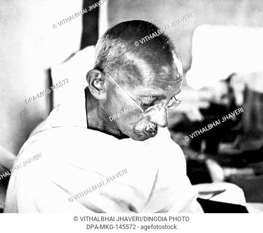 Mahatma Gandhi in his hut at Sevagram Ashram , 1944 NO MR