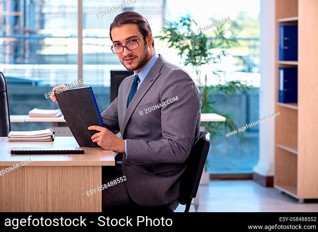 Young employee working in the office