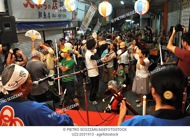 Naha, Okinawa, Japan, people dancing during a music party at Sakaemachi Market
