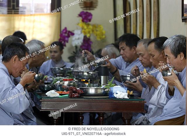 Truc Lam buddhist temple. Worshippers having vegan meal. Dalat. Vietnam