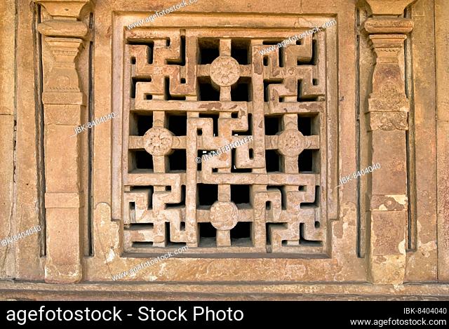 Carved stone window in Durga fortress temple in Aihole, Karnataka, South India, India, Asia