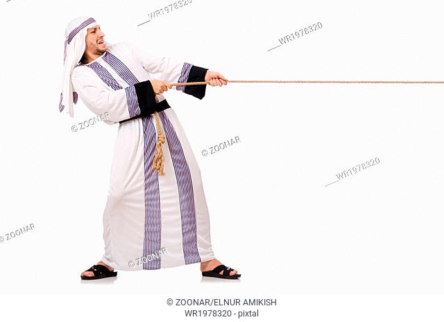 Arab man in tug of war concept