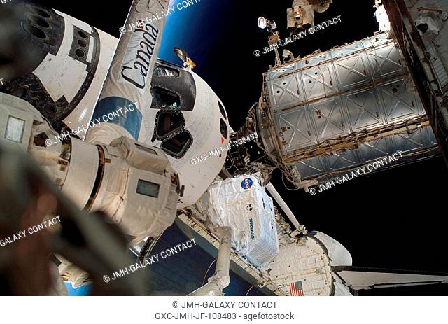 Most of the surface elements of the Space Shuttle Endeavour are visible in this unique angle captured during the week's third spacewalk to perform work on the...