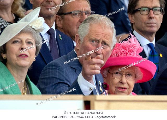 05 June 2019, Great Britain, Portsmouth: Theresa May (l-r), Prime Minister of Great Britain, Prince Charles of Wales, Queen Elizabeth II of Great Britain