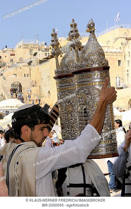 Torah being lifted in all cardinal directions during the Bar Mitzwa ceremony, Jewish quarter of the historic centre in the back, Arab quarter, Jerusalem, Israel