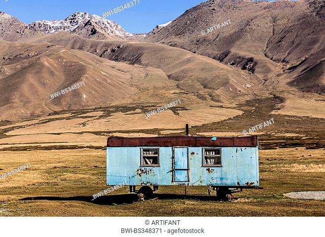 old residential container as a summer accommodation for the herdsmen in wasteland, Kyrgyzstan, Djalalabad, Taskoemuer