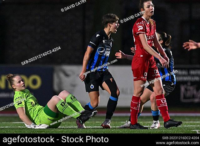 Isabelle Iliano (18) of Club YLA pictured celebrating after scoring the 1-0 goal while goalkeeper Lowiese Seynhaeve (1) of Zulte-Waregem and Nicky Van Den...