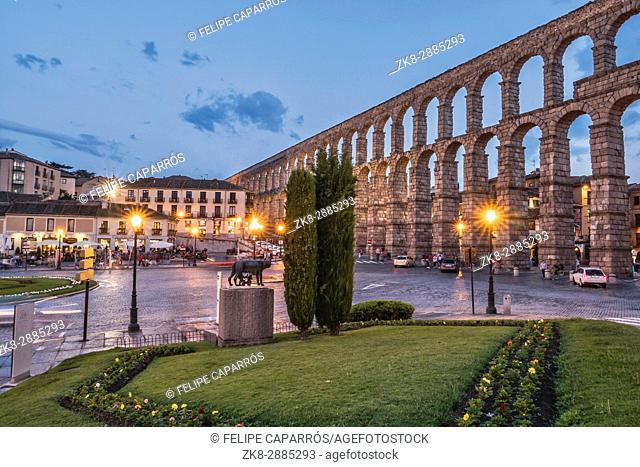 Partial view of the Roman aqueduct located in the city of Segovia at night , Unesco World Heritage Site, Spain