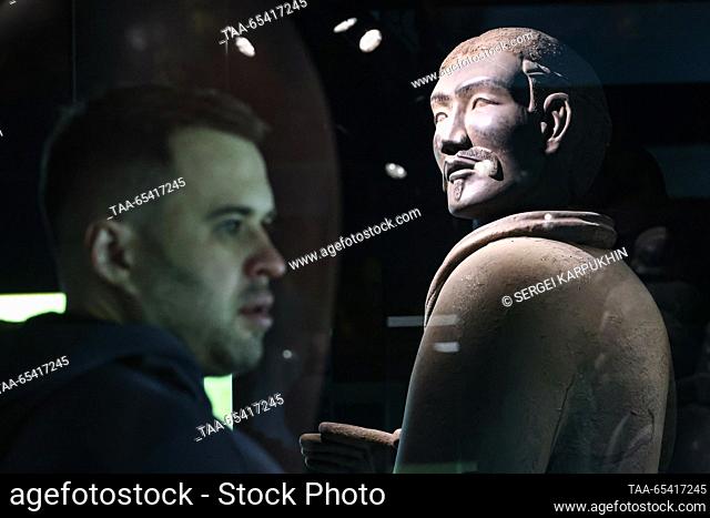 RUSSIA, MOSCOW - DECEMBER 2, 2023: A man attends an exhibition titled ""The Terracotta Army: The Immortal Warriors of China"" at Pavilion 22 at the VDNKh...
