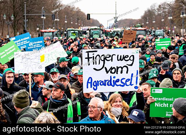 18 December 2023, Berlin: At a demonstration organized by the German Farmers' Association under the slogan ""Too much is too much! Now it's over!"" in front of...