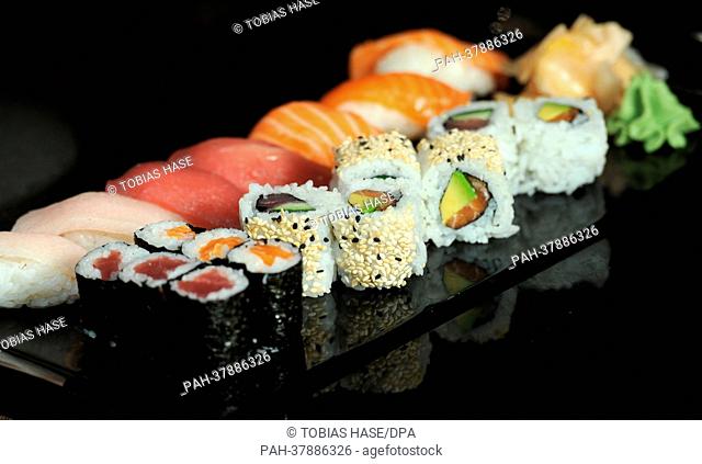 A platter with different types of sushi - maki (front), nigiri (L) and inside-out - is pictured at the restaurant Zen of the Hotel Westin Grand in Munich