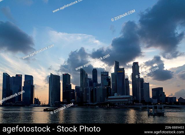Singapore, Singapore - January 30, 2015: The central business district skyline during sunset time. The CBD contains the core financial and commercial districts...