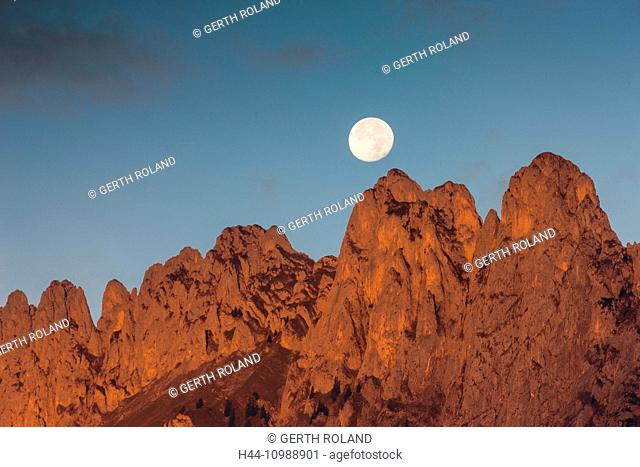 moon over Kreuzberge mountains in the canton of St. Gall, Rhine Valley
