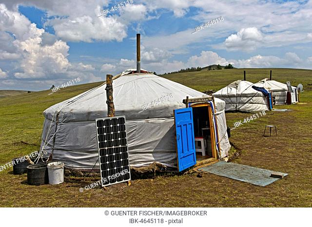 Yurts with solar cell and satellite dish in the steppe, near Erdenet, Mongolia