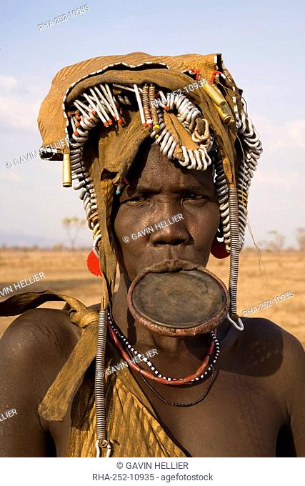 Portrait of a Mursi woman with clay lip plate, Mursi Hills, Mago National Park, Lower Omo Valley, Ethiopia, Africa
