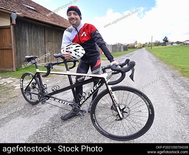 Blind cyclist Ondrej Zmeskal shows his tandem bicycle on May 7, 2021, in Novy Teleckov, Trebic region, Czech Republic. This year, as the first blind athlete