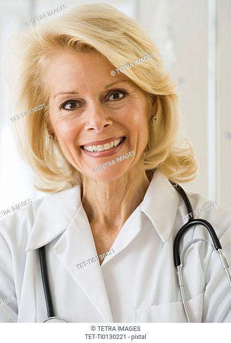 Female doctor with stethoscope around neck