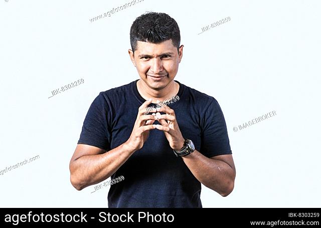 Person rubbing his hands planning something, Cunning man rubbing his hands on isolated background, concept of cunning man planning something