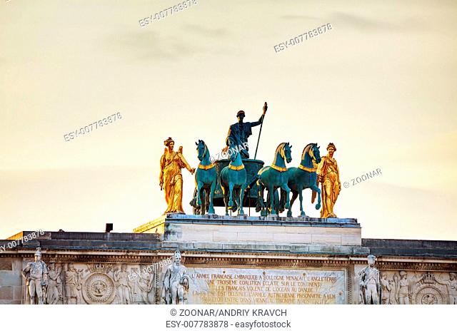 Sculpture of the chariot on top of the Arc de Trio