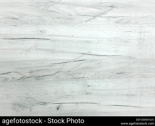 Light soft wood surface as background, wood texture. Grunge washed wood planks table pattern top view