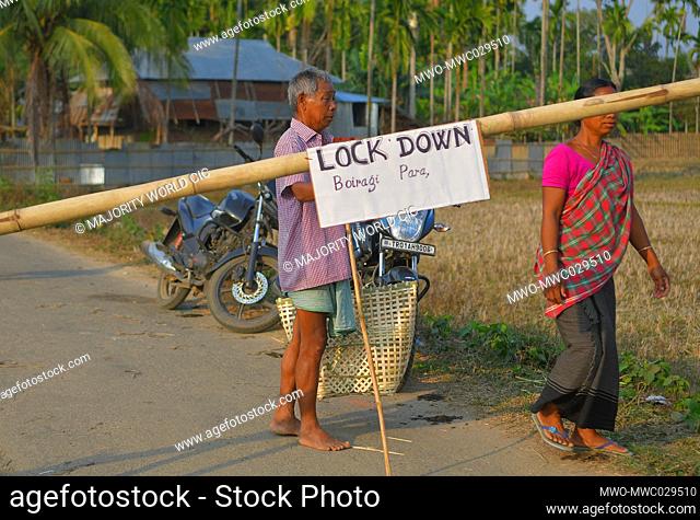 AGARTALA, TRIPURA, INDIA, 27-03-2020 :People are crossing the bars , to enter  , the Bairagi Para ADC Villages , as the people of Bairagi Para , have decided
