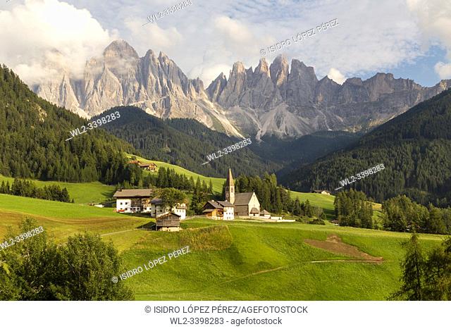 Val di Funes, a beautiful valley where the small Santa Magdalena church marks its strategic position for one of the most impressive postcards of the Dolomites