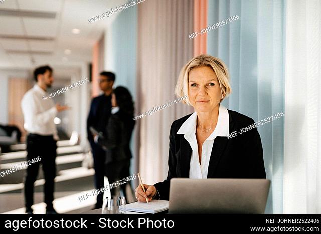 Businesswoman sitting in office