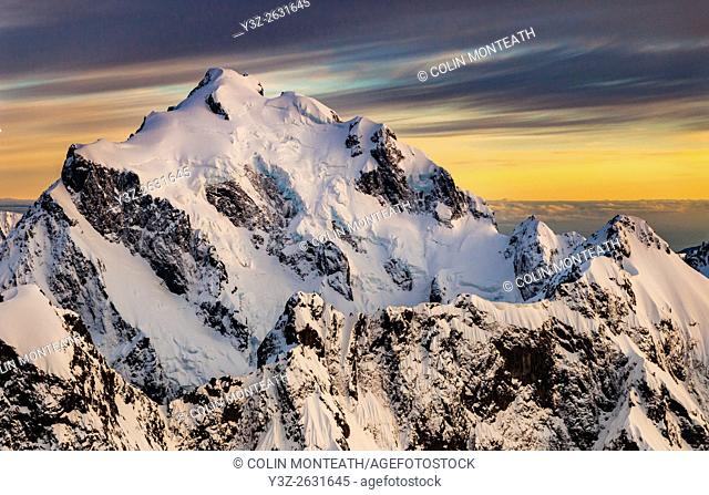 Mt Tutoko (2, 723 m) at dawn, highest peak in Darran Mountains, aerial view over Hollyford Valley, Fiordland National Park, New Zealand