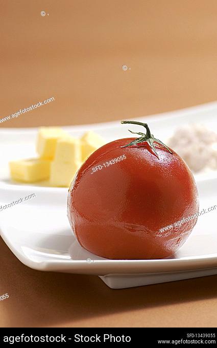 Jellied tomato with butter and cream