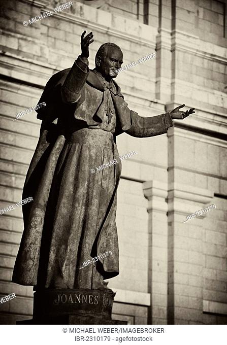 Statue of Pope John Paul II, monument, open arms, sepia, vignette, Catedral de Nuestra Señora de la Almudena cathedral, Santa María la Real de La Almudena