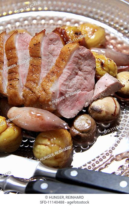 Duck breast with mushrooms, shallots and chestnuts