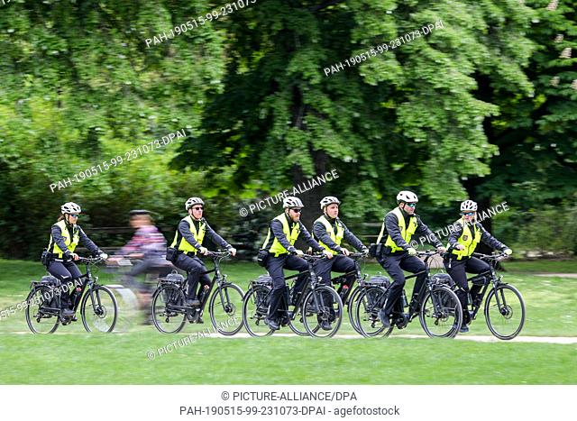 15 May 2019, Saxony, Leipzig: The new bicycle squadron of the Ordnungsamt Leipzig drives through the Johannapark. From now on
