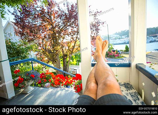 Man relaxing on the porch