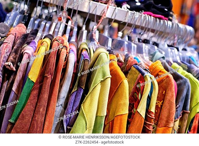 Colorful clothes on a clothes rack