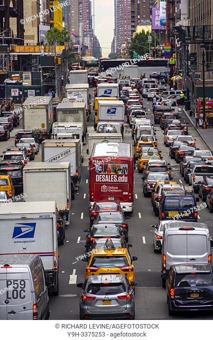Vehicles clog Tenth Avenue in New York on Tuesday, July 2, 2019 as they attempt to enter the Lincoln Tunnel during the Great Fourth of July Getaway