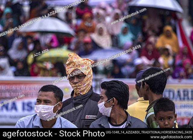 A number of enthusiastic spectators watched the horse racing race at HM Hasan, Blang Bebangka, Central Aceh District, Aceh Province, Indonesia