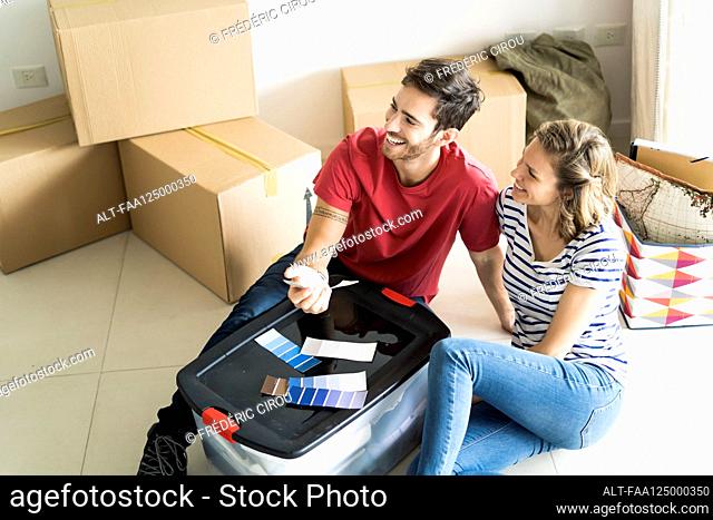 Young couple discussing in new house