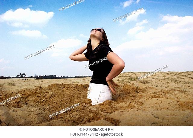 sand, released, buried, female, woman, model