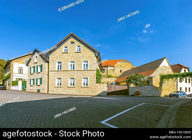 House in the center of Stadecken, Rheinhessen, in the background the castle Stadeck