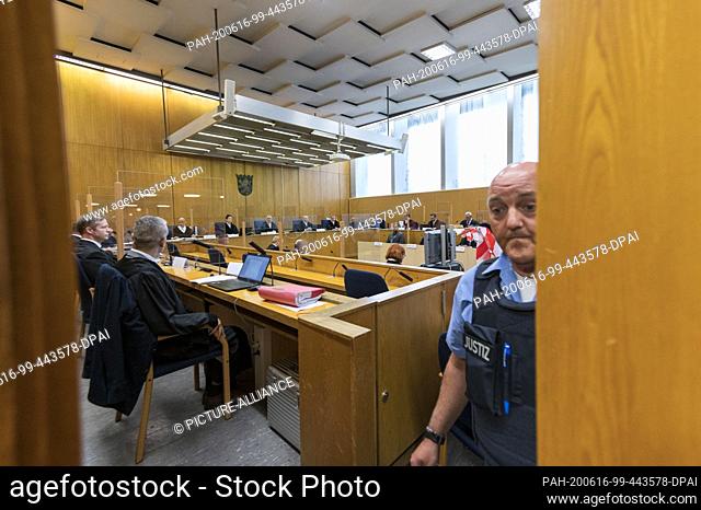 16 June 2020, Hessen, Frankfurt/Main: Stephan Ernst (l), main defendant in the Lübcke trial, sits next to his lawyer Mustafa Kaplan (front
