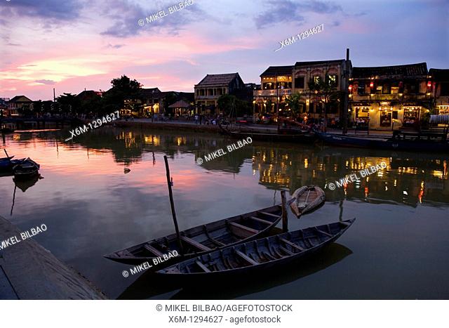 edifices, boats and Thu Bon river at sunset  Hoi An, Vietnam, Asia