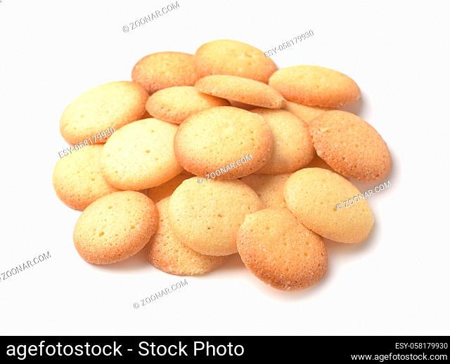 Pile of small round cookies isolated on white