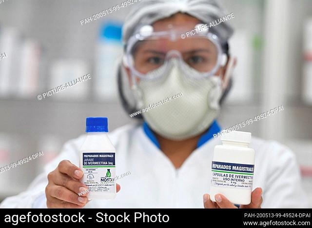 13 May 2020, Bolivia, Santa Cruz: A pharmacist shows doses of ivermectin. The antiparasitic became the hope of the South American country