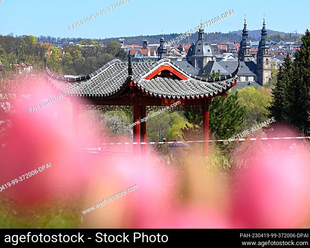 19 April 2023, Hesse, Fulda: In sight of the cathedral is a temple of the Chinese partner region Liyang on the area of the national horticultural show Fulda 2
