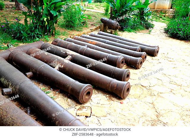 Long cannons and a short cannon in its cradle collected by the Powder Magazine of Fort Jacques, Haiti